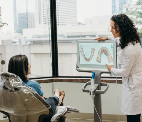 Dr. Hays reviewing a digital dental scan with a patient